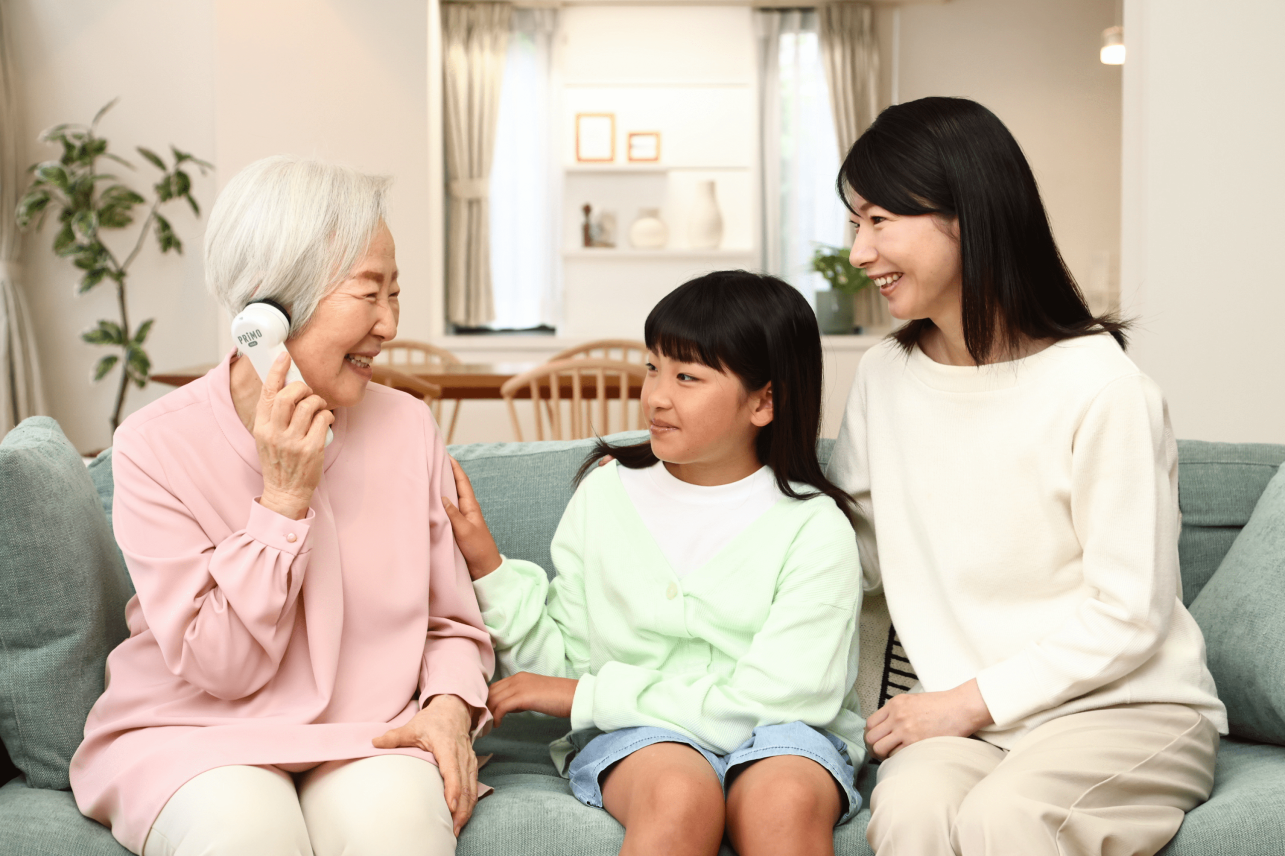 A family enjoying a conversation with the CHO-ROKU.