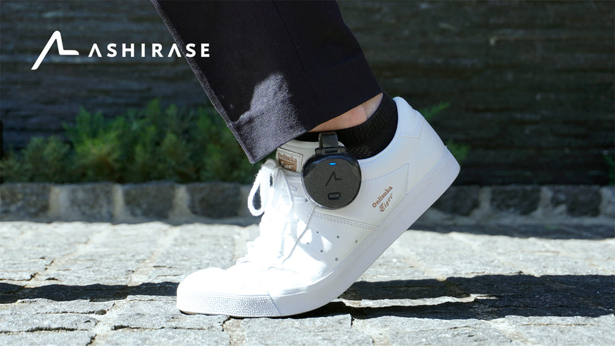 The World’s First Shoe-Mounted Haptic Navigation System: ASHIRASE